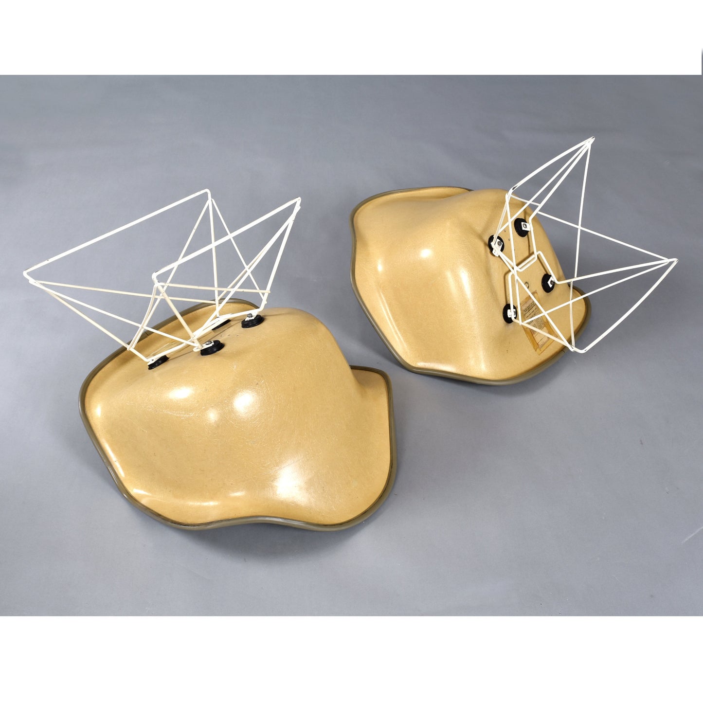 Pair of Eames for Herman Miller LAR Shell Chairs with Yellow Naugahyde Pads